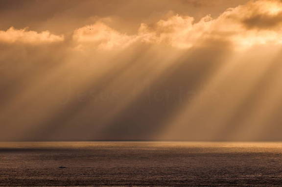 sol,nubes,gaviota y barco